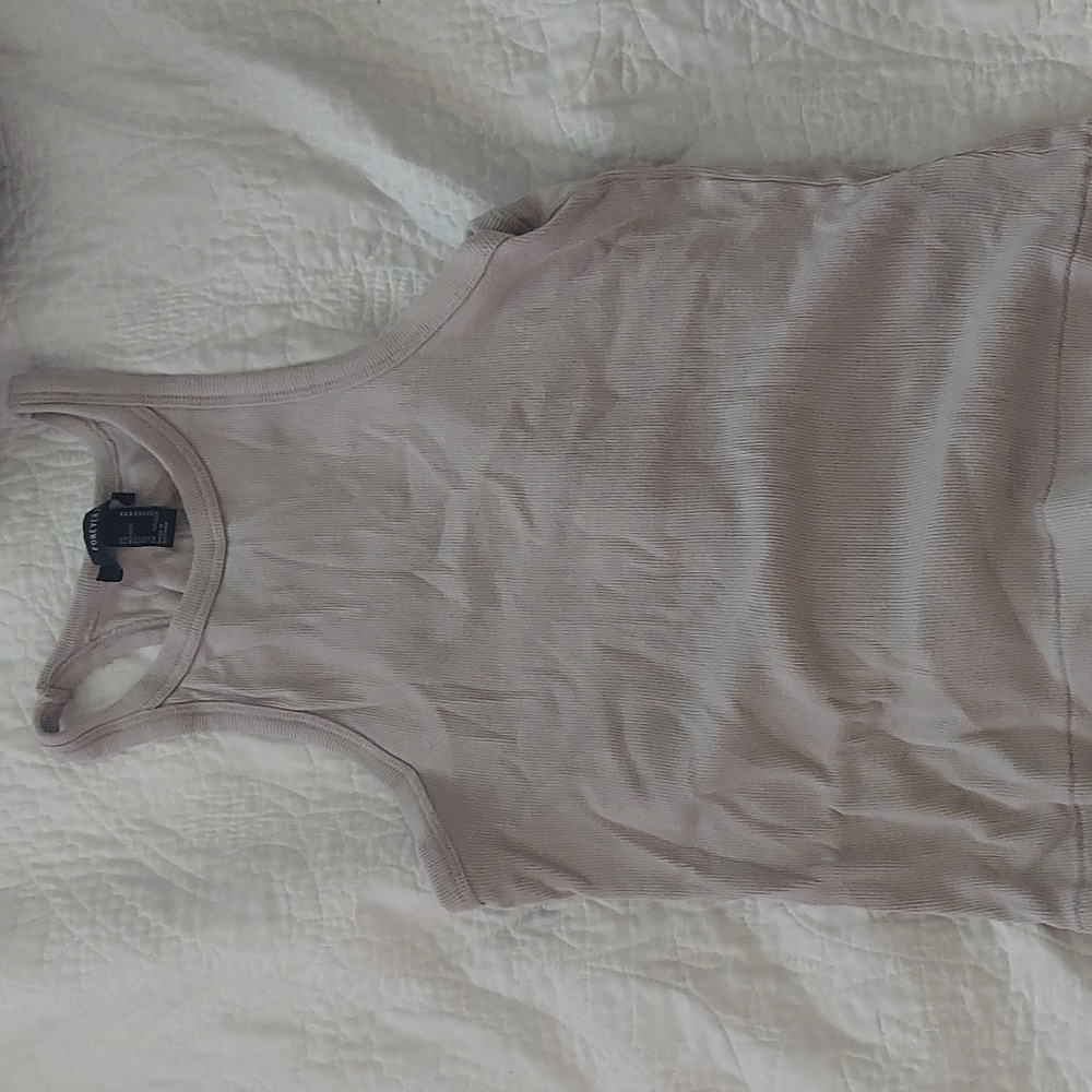 A grey crop top shirt that is barely used